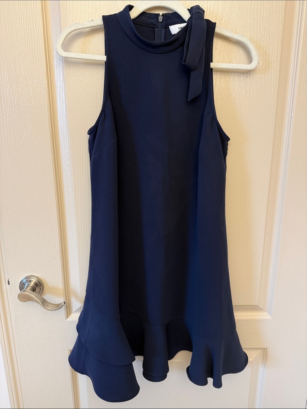 Likely Navy Sleeveless Dress with Bow and Ruffle Hem